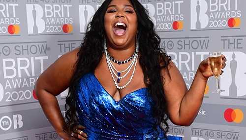 Twerks, Tiger Stripes & Toasts: Lizzo Looked Good As Hell During Boozy Birthday Baddiecay In Vegas [Photos]