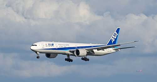 Unruly passenger attempted to open exit doors mid-flight, forced plane to divert to Seattle